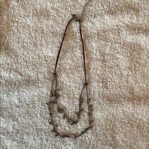 Elegant Silver Teardrop Necklace with Brown Cord